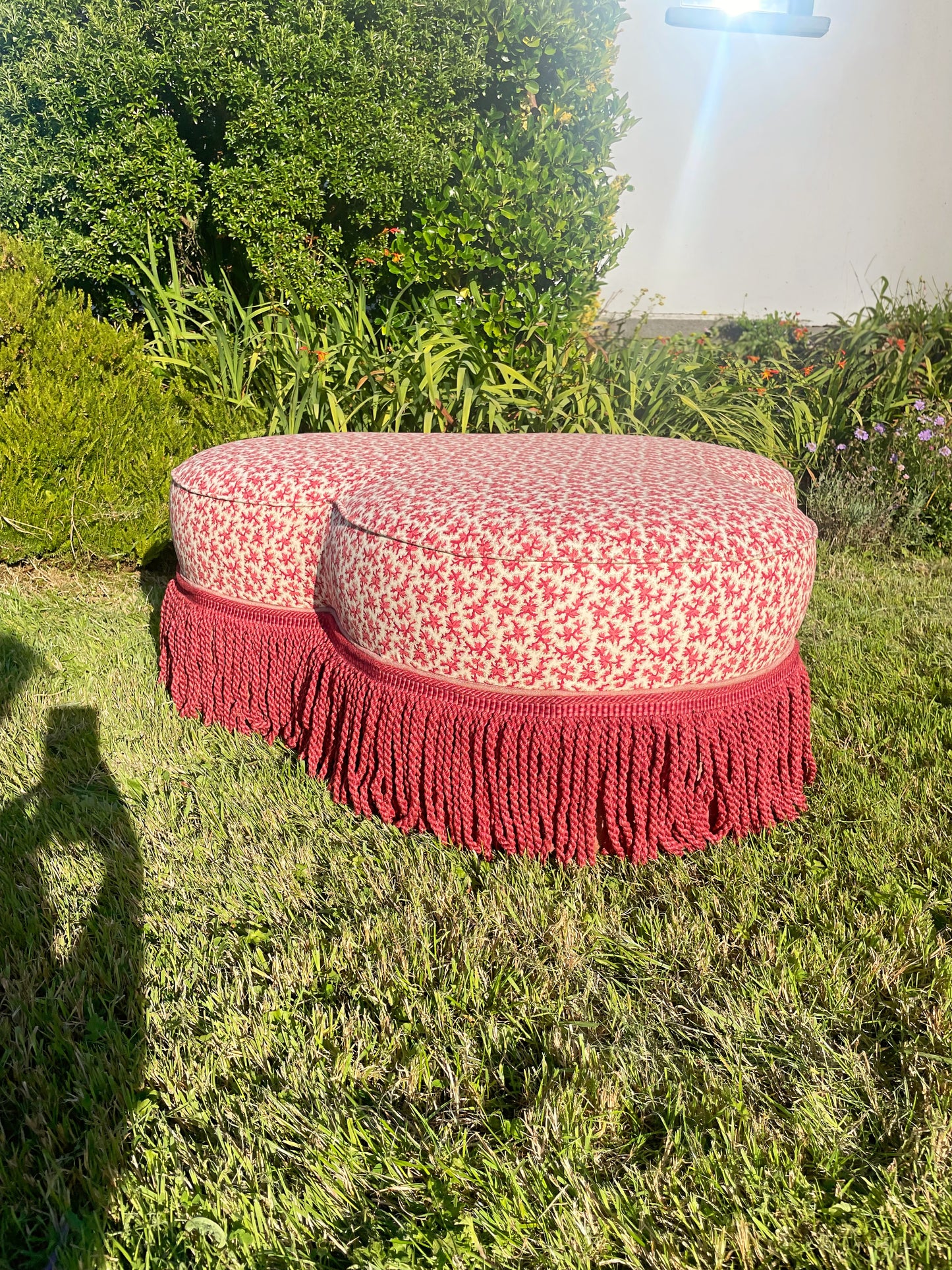 Trefoil ottoman footstool in Colefax Oak Twig