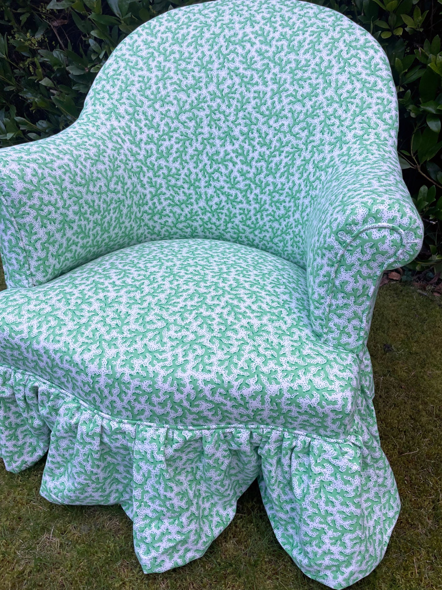 Schumacher ‘Sea Coral’ skirted armchair