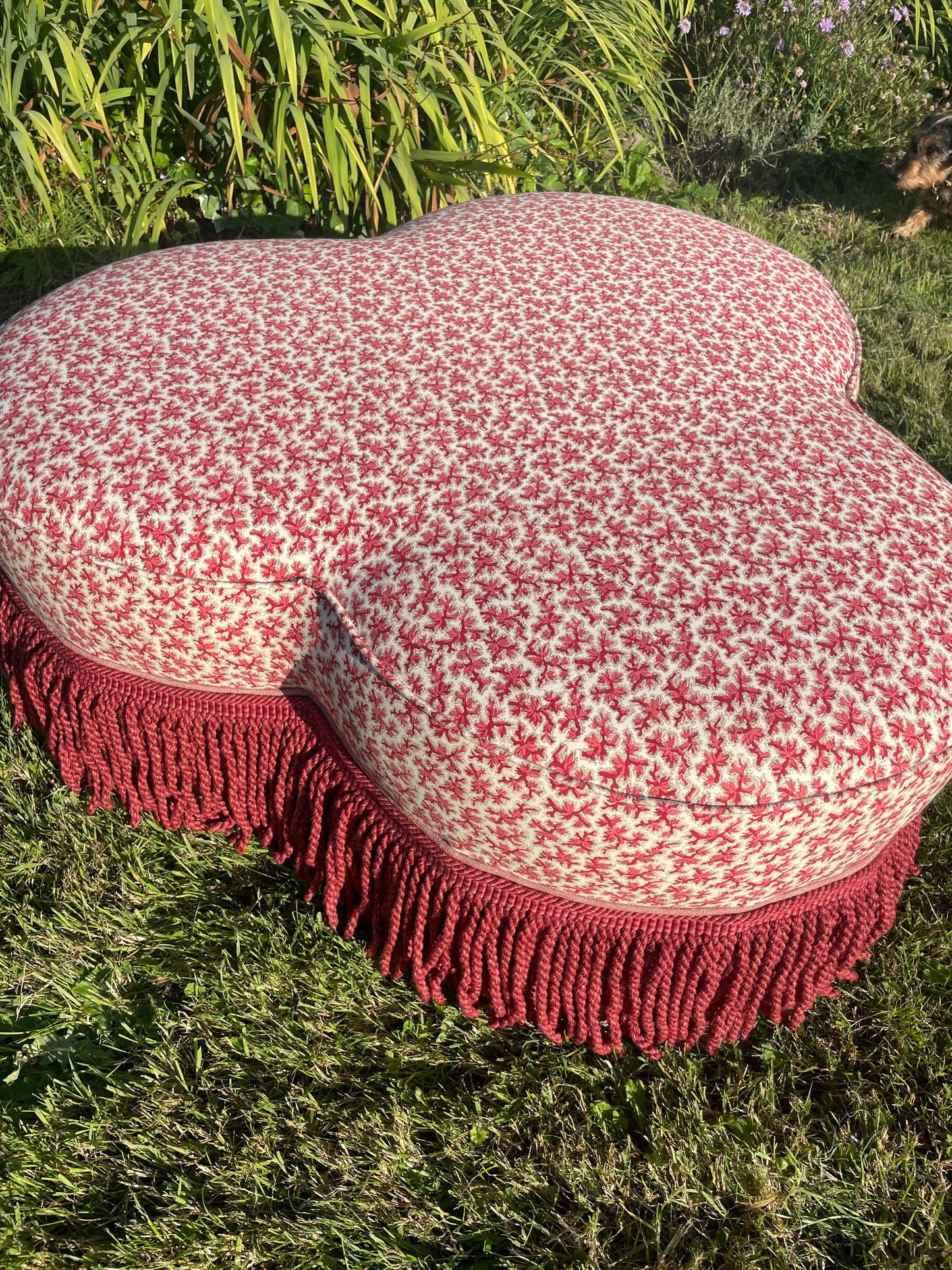 Trefoil ottoman footstool in Colefax Oak Twig