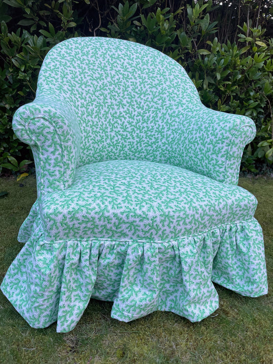 Schumacher ‘Sea Coral’ skirted armchair