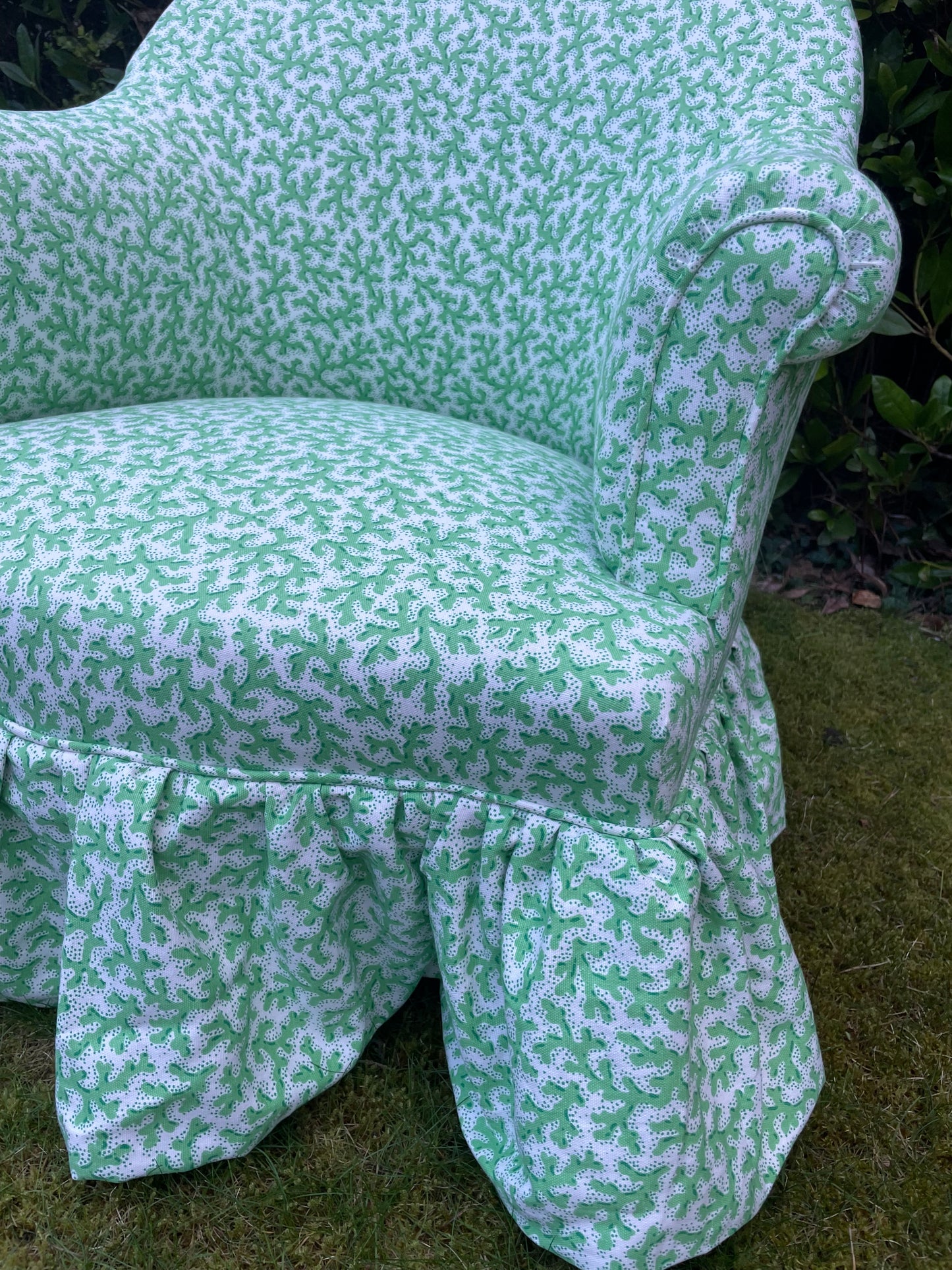 Schumacher ‘Sea Coral’ skirted armchair